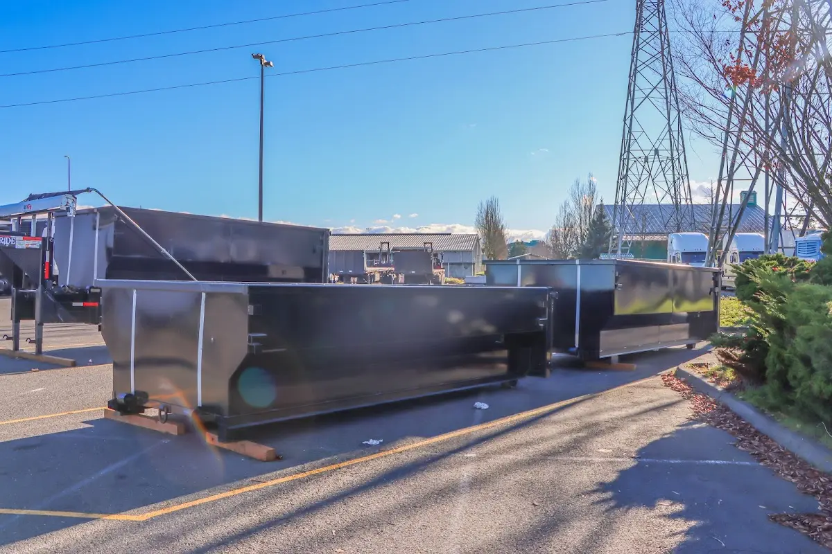 Roll-off dumpster ready for waste disposal at job site for 2 Yard Dumpster Rental in Monticello